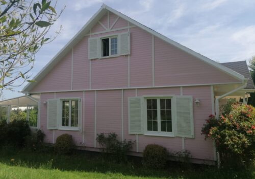 Casa rosa estilo nórdico