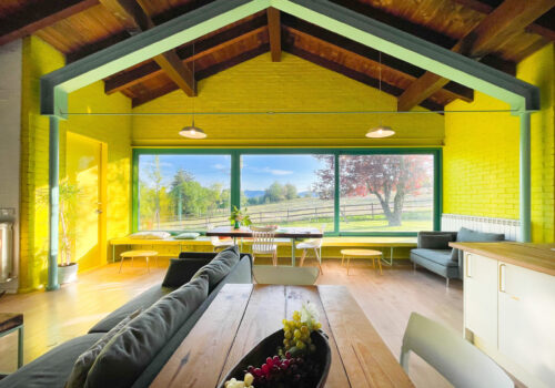 Yellow design house in the middle of the countryside
