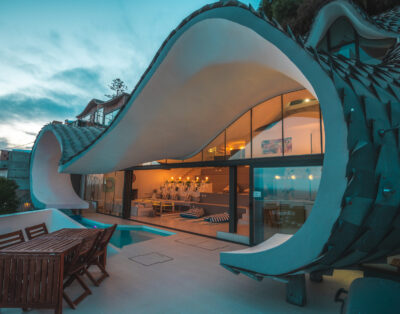 Fluid Brutalism Style House with sea view