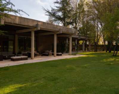 Brutalist-style space in a natural setting.